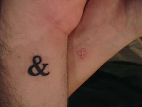 Black And White Ampersand Wrist Tattoo