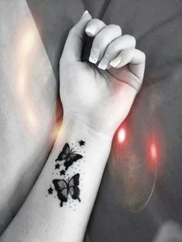 Black And White Butterfly Tattoo On Wrist