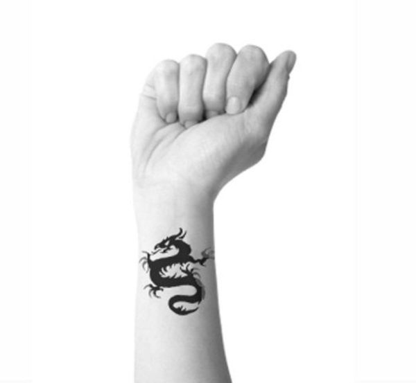 Black And White Dragon Wrist Tattoo