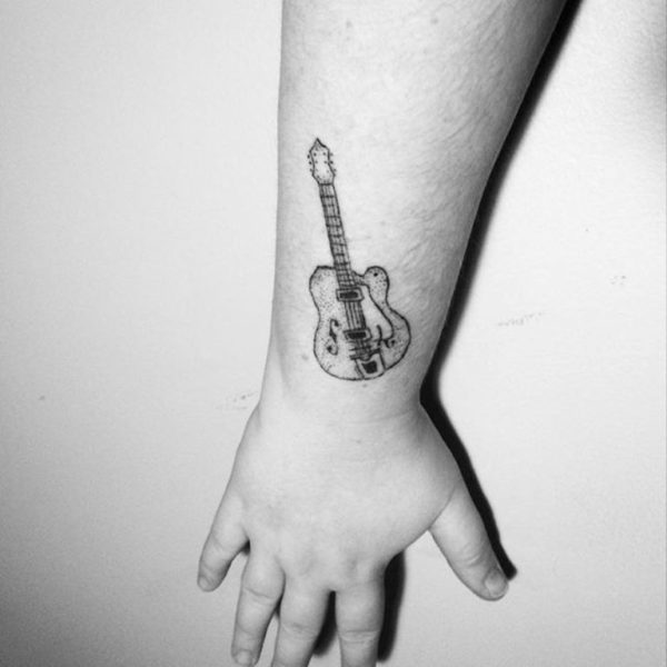 Black And White Guitar Wrist Tattoo