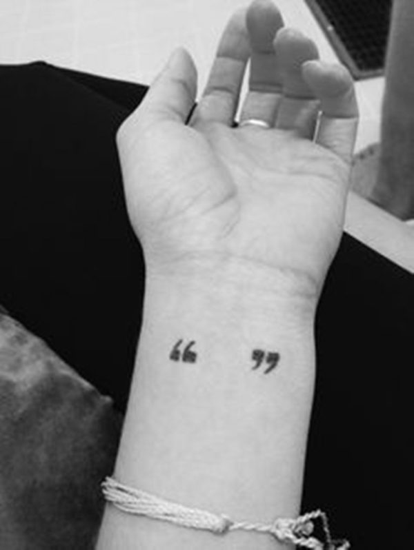 Black And White Quotation Tattoo On Wrist