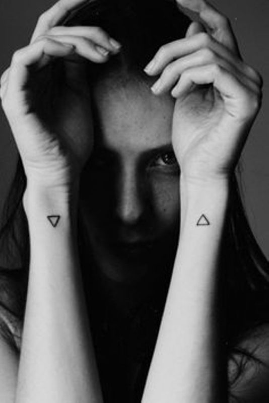 Black And White Triangle Tattoo On Wrist