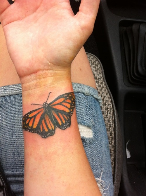 Black And Yellow Butterfly Tattoo