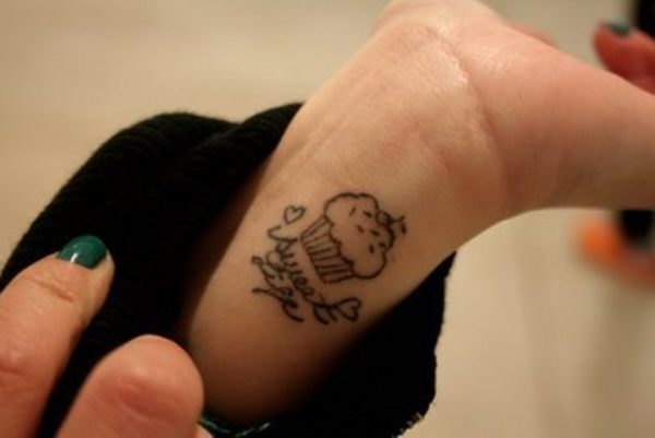 Black Cupcake Tattoo On Wrist