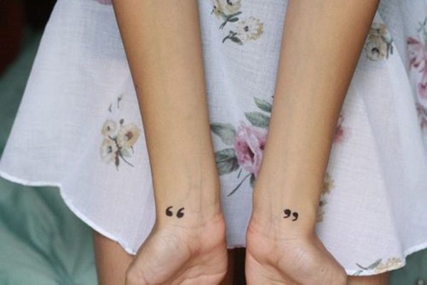 Black Quotation Mark Tattoo On Wrist