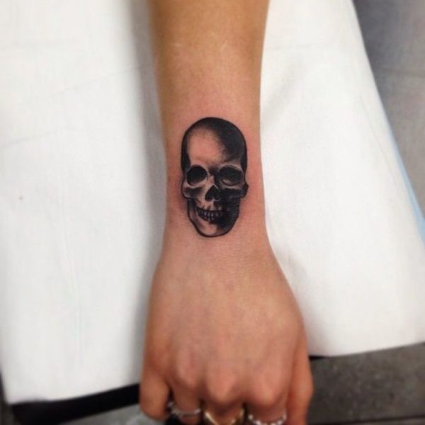 Black Skull Tattoo On Wrist