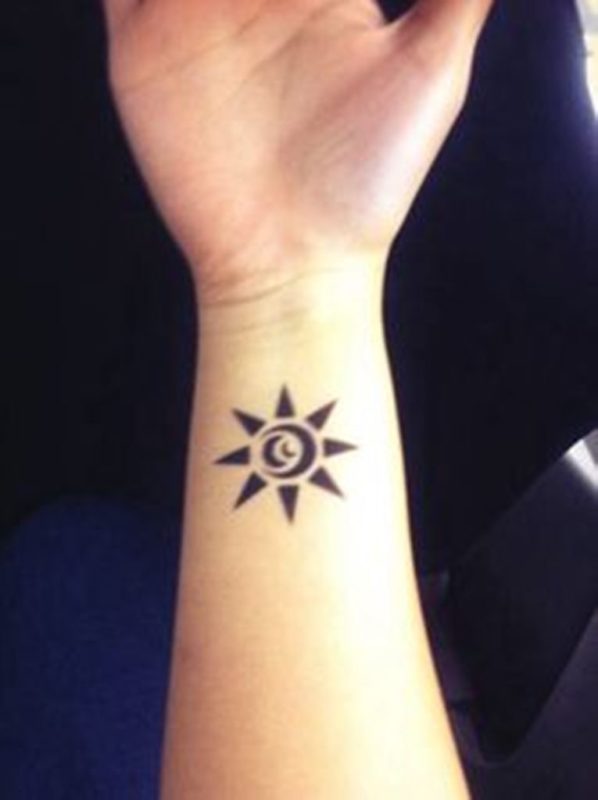 Black Sun Tattoo On Wrist