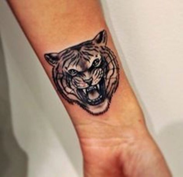 Black Tiger Face Tattoo On Wrist