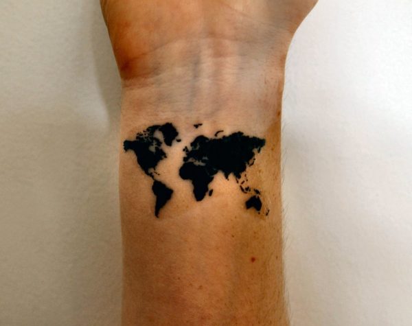 Black World Map Tattoo On Wrist