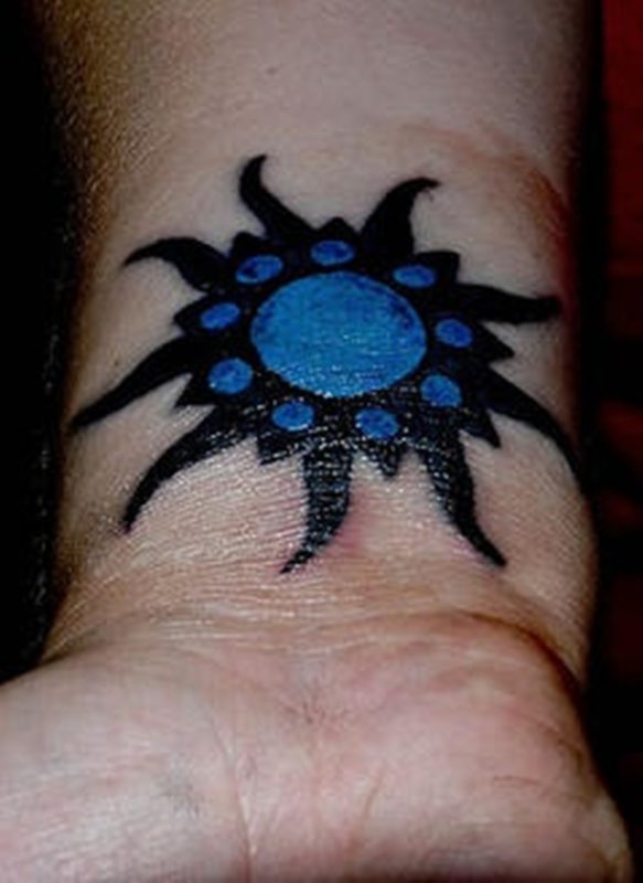 Blue Sun Tattoo On Wrist