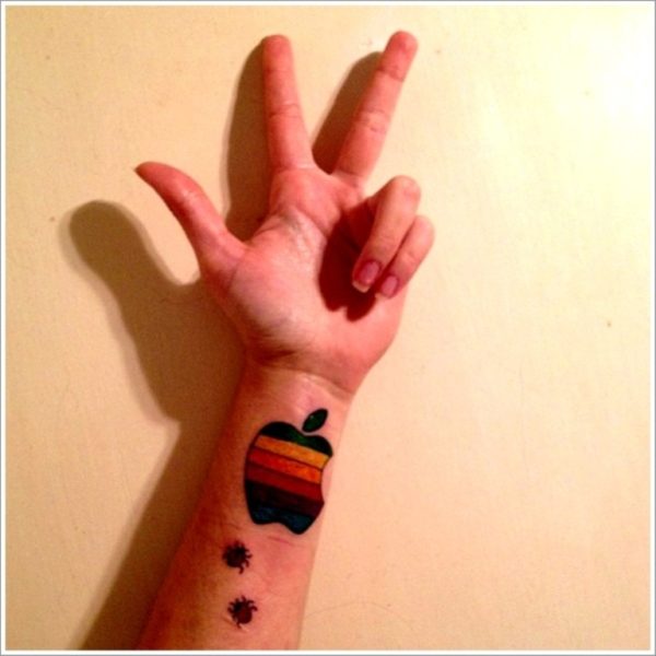 Colored Apple Logo Tattoo On Wrist