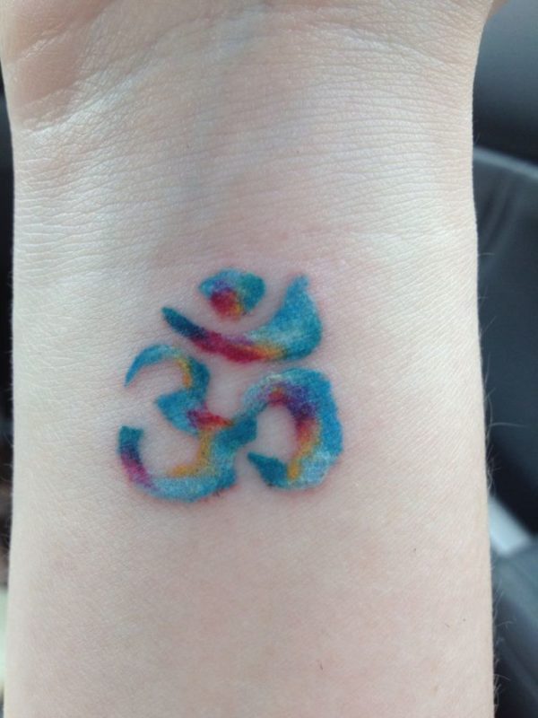 Colorful Om Tattoo On Wrist
