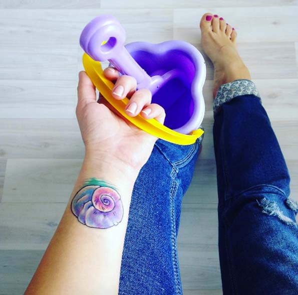 Colorful Seashell Tattoo On Wrist