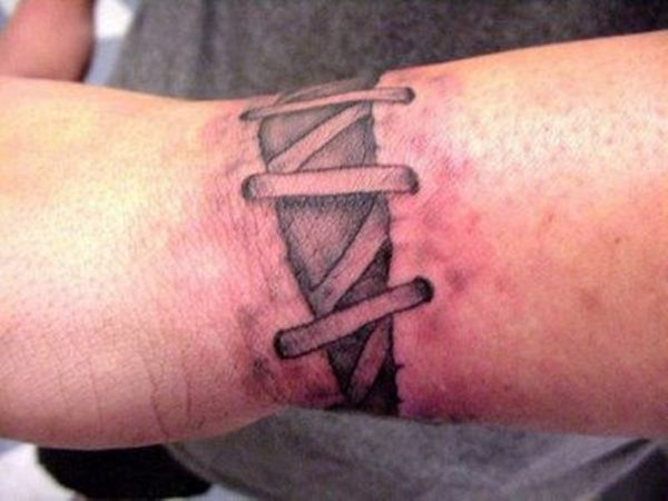 Corset Tattoo On Wrist