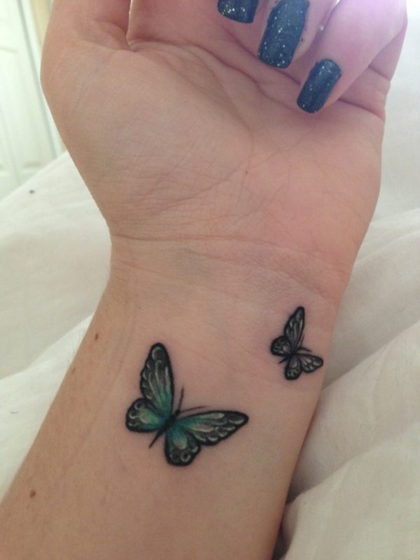 Cute Green Butterfly Tattoo On Wrist