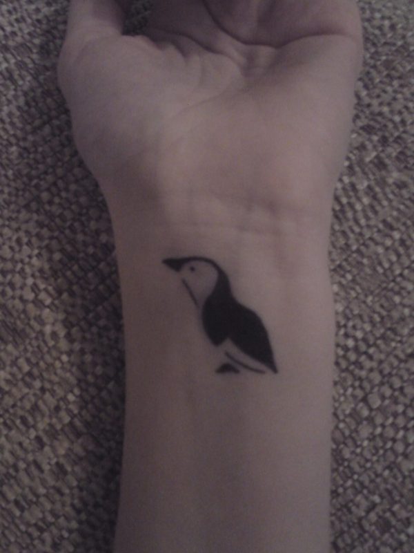 Cute Penguin Tattoo On Wrist