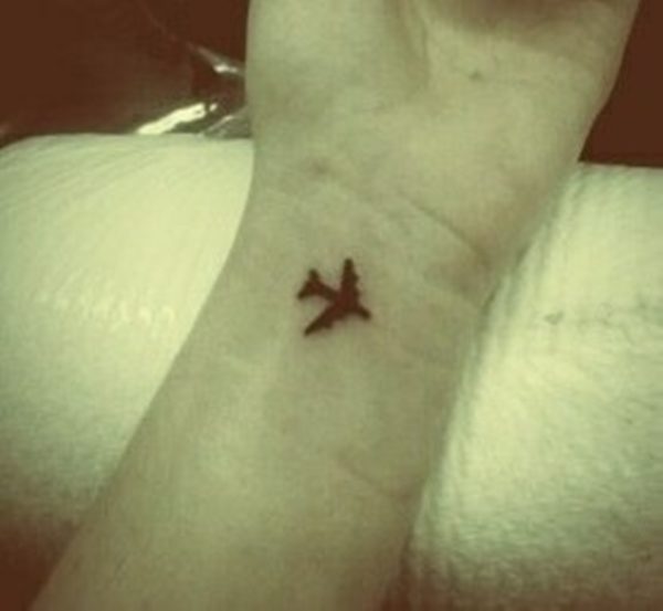 Cute Plane Tattoo On Wrist