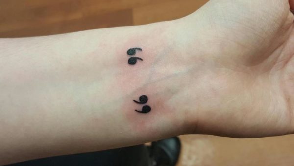 Cute Quotation Mark Wrist Tattoo