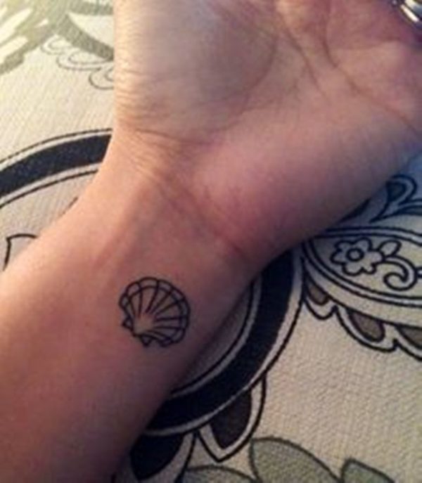 Cute Sea Shell Tattoo On Wrist