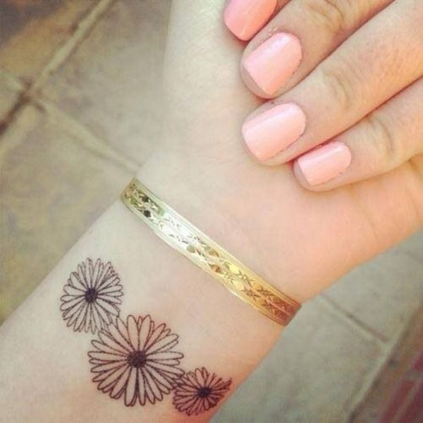 Daisy Flower Tattoo On Wrist