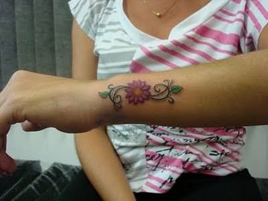 Daisy Flower Tattoo.