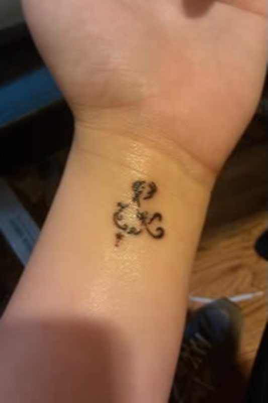 Designer Ampersand Wrist Tattoo