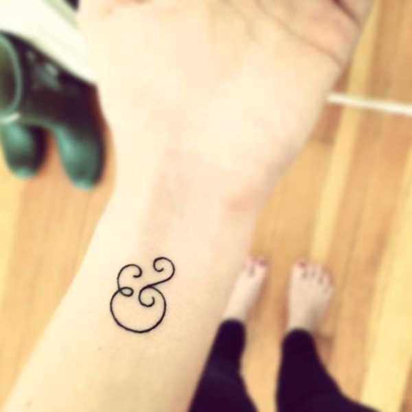 Elegant Ampersand Wrist Tattoo