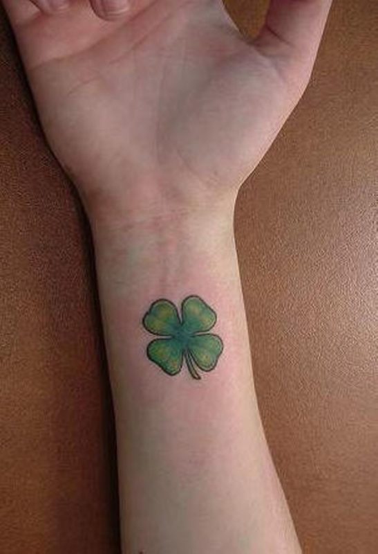 Elegant Four Leaf Tattoo On Wrist