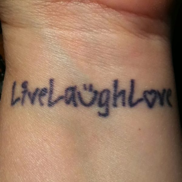 Elegant Live Laugh Tattoo On Wrist