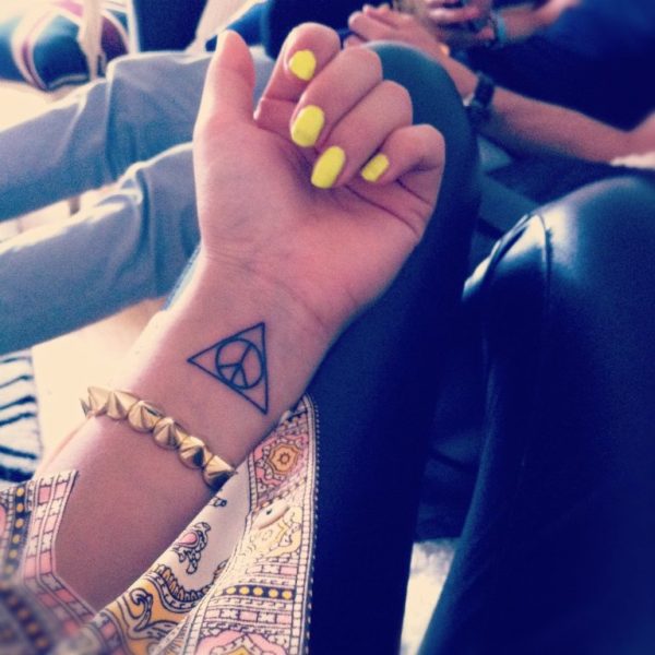 Enticing Triangle Wrist Tattoo