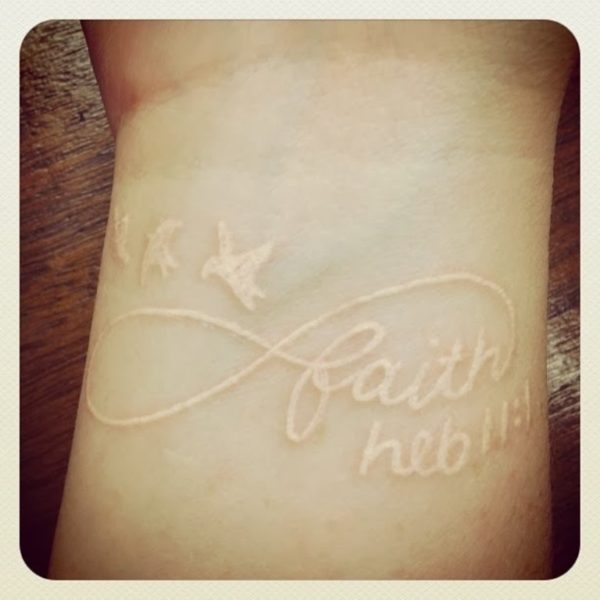 Faith Flying Birds White Ink Tattoo On Wrist