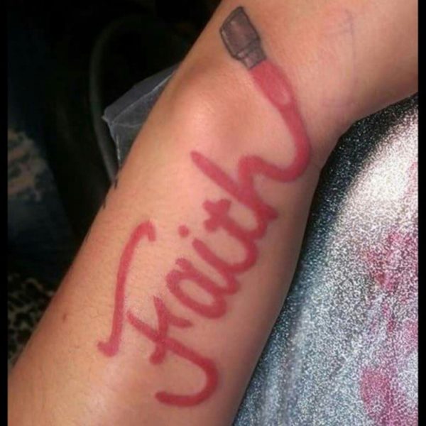 Faith Lipstick Tattoo On Side Wrist
