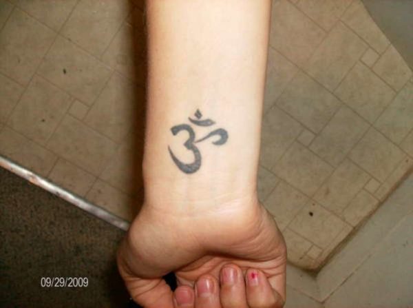 Fantastic Om Tattoo On Wrist