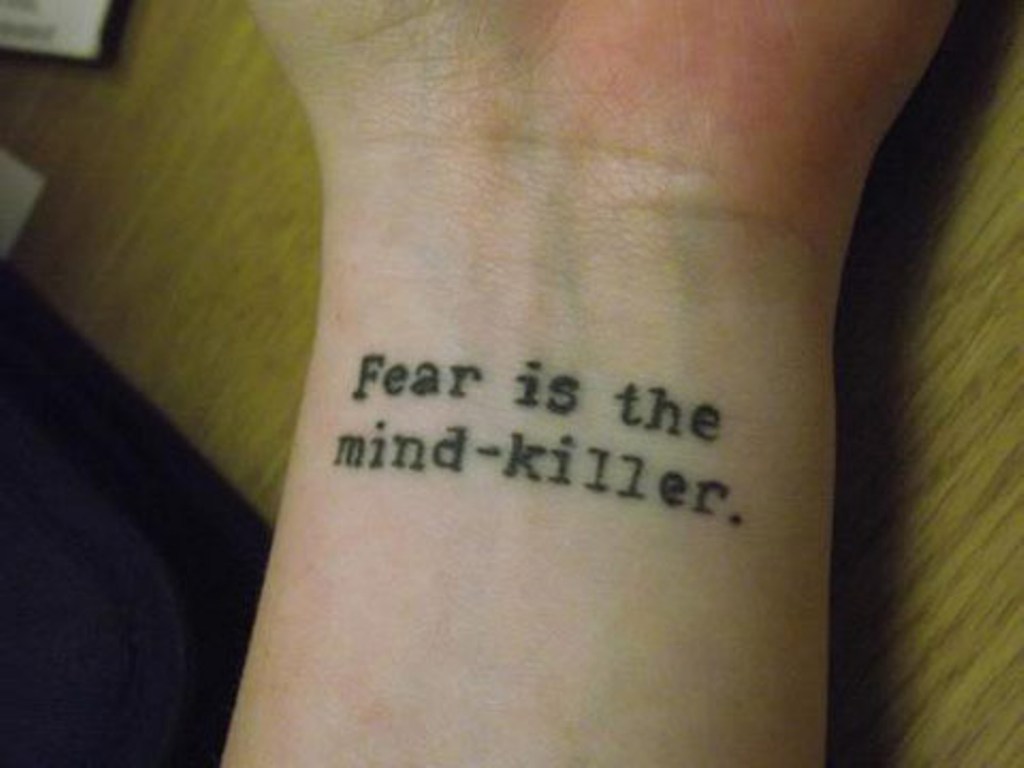 Fear Quote Tattoo On Wrist.