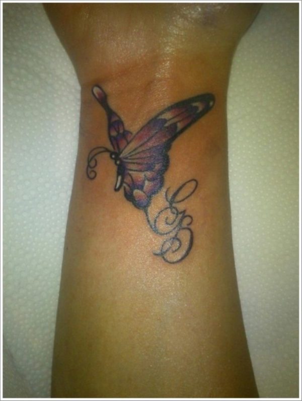 Flying Butterfly Tattoo On Wrist