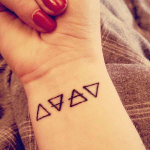 Four Triangle  Wrist Tattoo