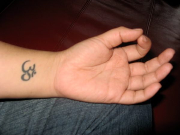 Graceful Om Tattoo