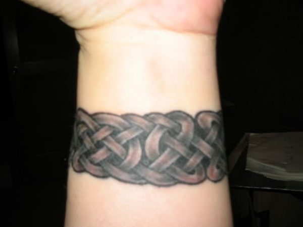 Graceful Celtic Wrist Tattoo