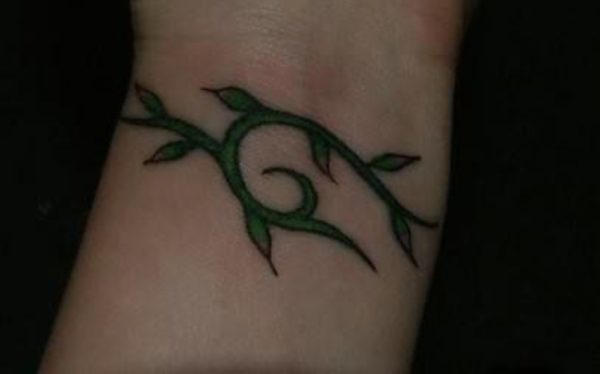 Green Leaves Tattoo On Wrist