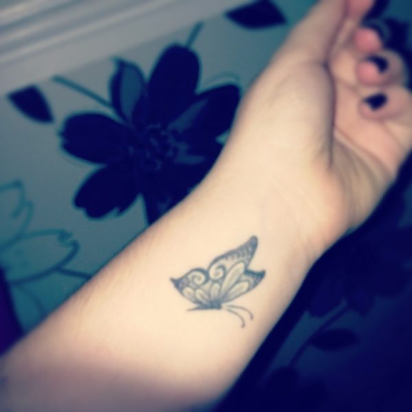 Grey Butterfly Tattoo On Wrist