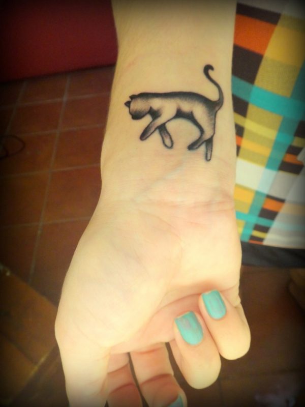Grey Ink Animal Tattoo On Wrist