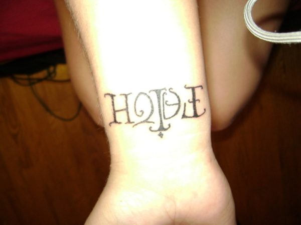 Hope Design Tattoo On Wrist