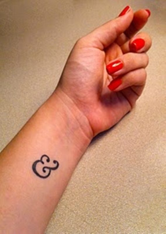 Impressive Ampersand Wrist Tattoo