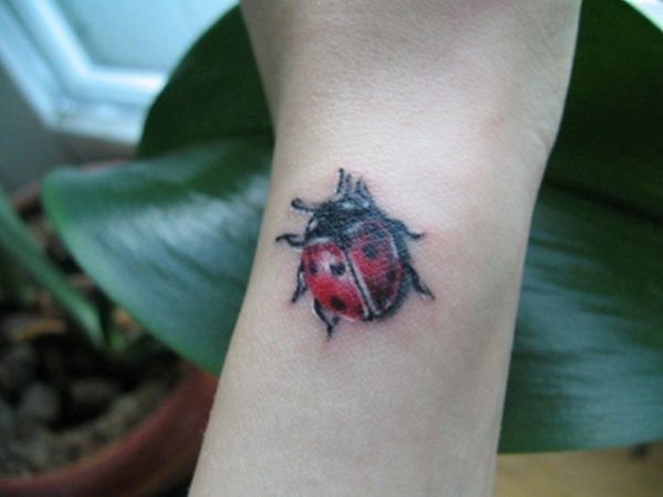 Impressive Ladybug Wrist Tattoo