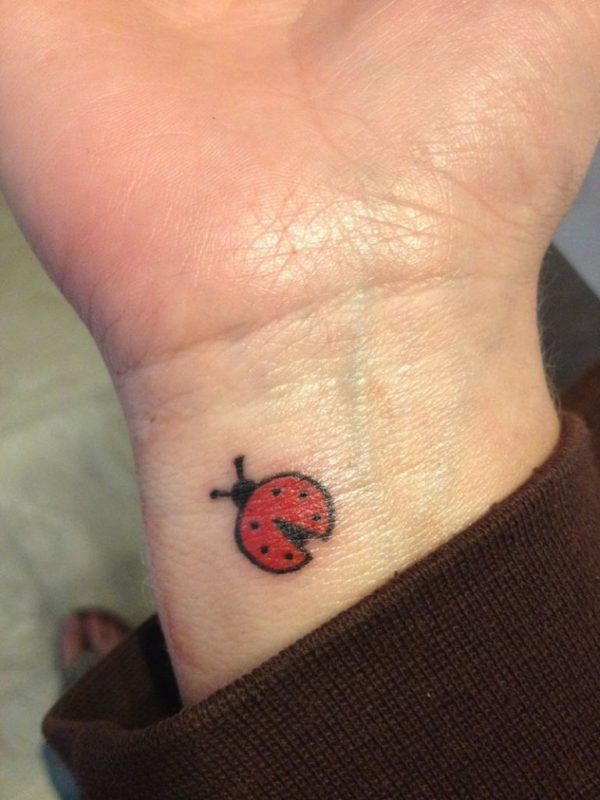 Ladybug Tattoo On Right Wrist