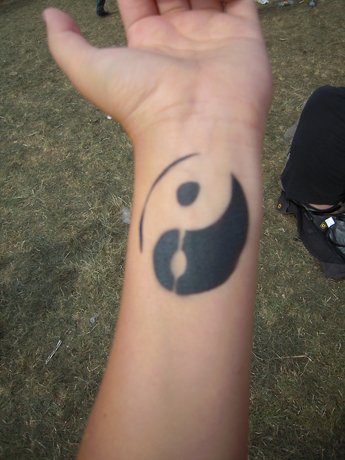 Large Yin Yang Tattoo On Wrist