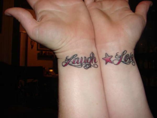 Laugh Love Wrist Tattoo
