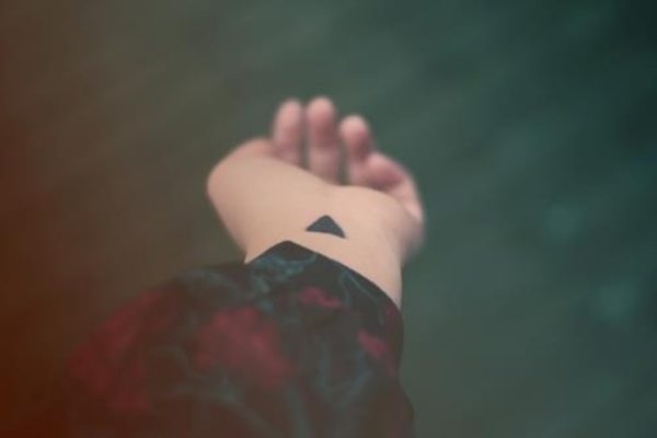 Little Black Triangle Tattoo