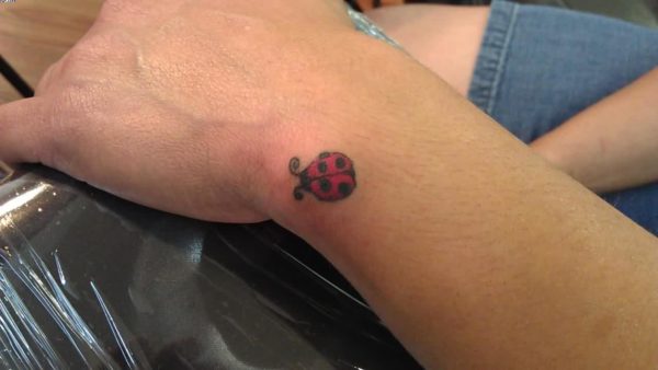 Little Red Ladybug Tattoo On Wrist
