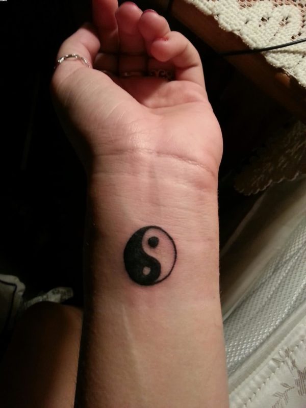 Little Yin Yang Tattoo On Wrist
